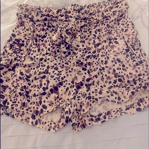 Cute paper cut style shorts ties in the front and slightly high waisted!!!